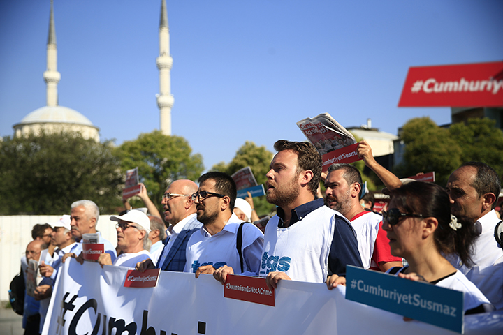Activists march to a court in Istanbul on July 24, 2017, in protest against the trial of journalists and staff from the Cumhuriyet newspaper. According to CPJ research, Turkey is one of worst jailer of journalists. (AP/Lefteris Pitarakis)