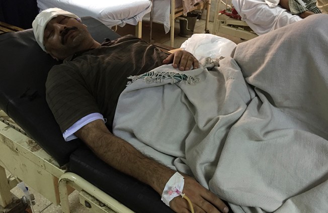 Pakistani investigative reporter Ahmed Noorani lies in a hospital bed in Islamabad, Pakistan, on October 27, 2017. Assailants on motorcycles attacked the outspoken Pakistani journalist in the capital, Islamabad, leaving him badly injured. (AP/B.K. Bangash)