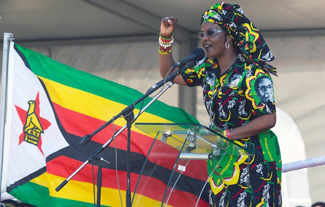 Zimbabwean First Lady Grace Mugabe addresses party supporters in Gweru, Zimbabwe, on September 1. Police detained a journalist, Kenneth Nyangani, for reporting that Mugabe allegedly donated used underwear and women's nightgowns to ruling party supporters. (AP/Tsvangirayi Mukwazhi)