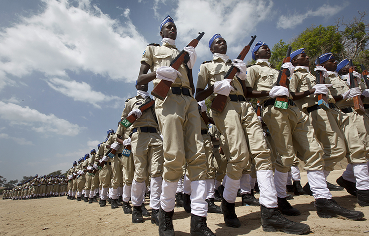 Somali police parade at a ceremony to mark the 74th anniversary of the formation of the police force, at the police academy in the capital Mogadishu, Somalia Wednesday, Dec. 20, 2017. (AP/Farah Abdi Warsameh)