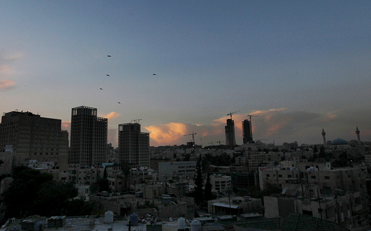 A sunset over Amman in 2012. Two Jordanian journalists are facing charges in the city over their reporting. (AP/Mohammad Hannon)