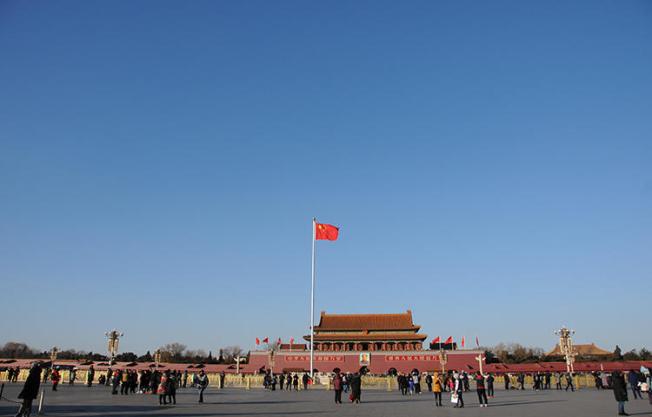 A Chinese flag flutters against blue sky in Tiananmen Square in Beijing, China in December 2017. The Foreign Correspondents' Club of China annual survey, released this week, showed a steady deterioration of working conditions in China for the foreign press. (Reuters/Stringer)