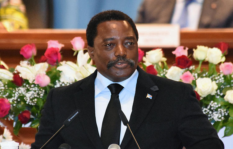 Democratic Republic of Congo's President Joseph Kabila addresses the nation at Palais du Peuple in the capital Kinshasa in April 2017. Agents from the Congolese military intelligence services accused journalist Willy Akonda of taking photographs that