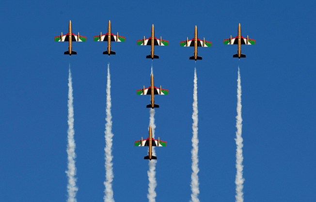 Aircrafts perform during an airshow in Riyadh, Saudi Arabia on January 11, 2018. A Kuwaiti national security court on December 25, 2017, found journalist Abdullah al-Saleh guilty in absentia of