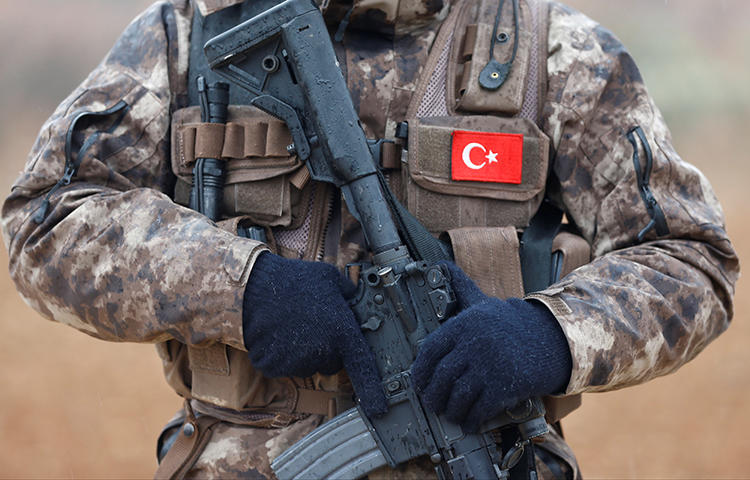 Turkish police special forces stand guard in Azaz, Syria on January 24, 2018. Prime Minister Binali Yıldırım asked journalists to frame Turkey's military incursions into northern Syria as an operation to protect the civilian population from terrorists, according to the online newspaper Odaty. (Reuters/Osman Orsal)