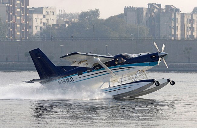A sea-plane takes off in Ahmedabad in December. A journalist says Dalit activists in the city attacked and threatened her when she tried to interview a patient. (Reuters/ Amit Dave)