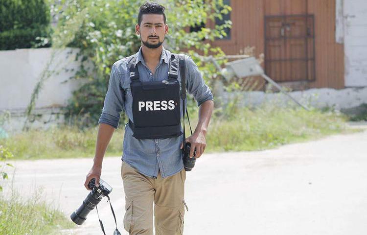 Photojournalist Kamran Yousuf, pictured, is facing charges after covering unrest in Jammu and Kashmir state. (Younis Khaliq)
