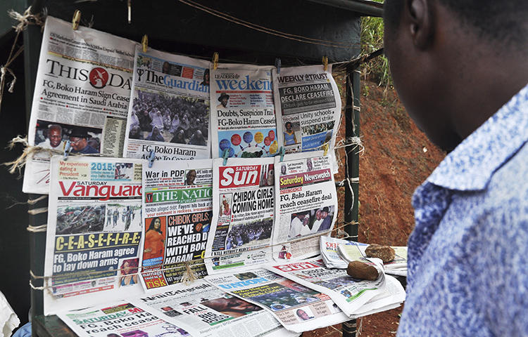 A news stand in Abuja, Nigeria in October 2014. A Nigerian court is scheduled to arraign brothers Timothy and Daniel Elombah, editor and chief executive respectively, of the independent Elombah news website, on cybercrime and terrorism-related offenses on March 1, 2018.(Reuters/ Stringer)