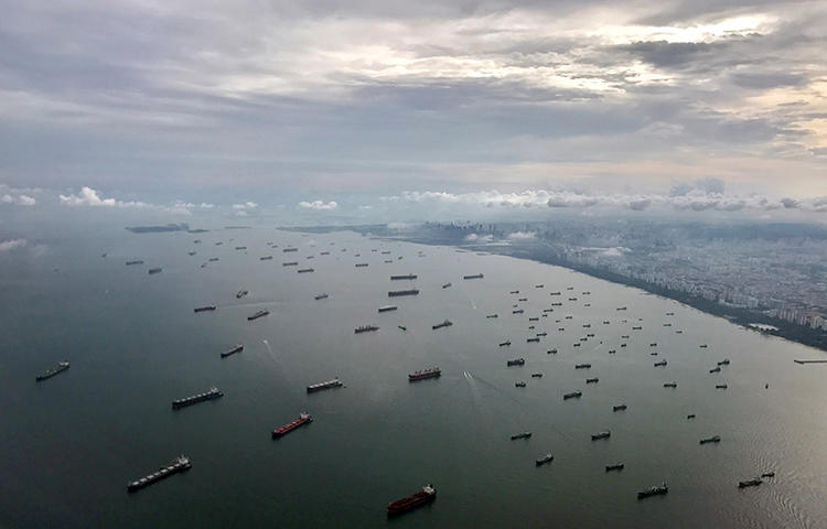 A bird's-eye view of ships along the coast in Singapore in July 2017. Singapore's parliament is considering draft legislation that would prevent journalists from reporting on what was happening terror attacks.(Reuters/Jorge Silva)
