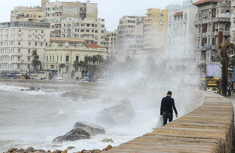 Stormy weather hits the Egyptian port city of Alexandria in January 2018. Police in the city are detaining two journalists for allegedly filming without a license. (AFP/Stringer)