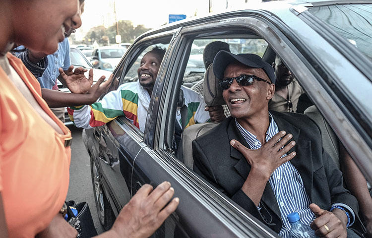 Ethiopian jounalist Eskinder Nega (center) is released from jail in February 2018. The country's authorities since re-arrested Eskinder and at least five other journalists. (AFP/Yonas Tadesse)