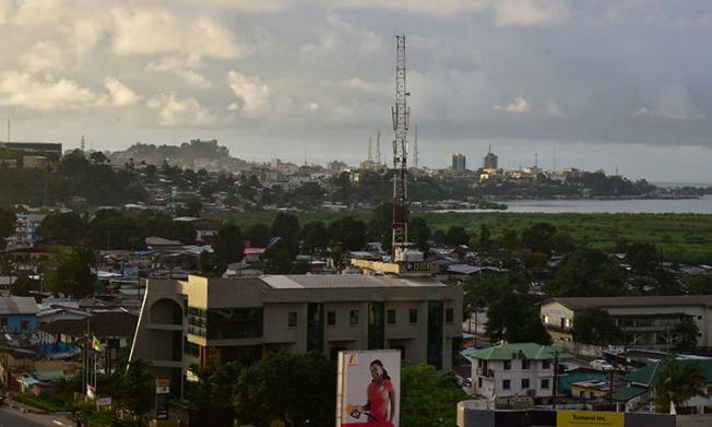 A view of Liberia's capital, Monrovia, in October 2017. Police are investigating the death of a journalist found stabbed outside his home in the city. (AFP/Issouf Sanogo)