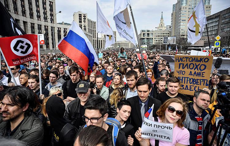 Protesters at an opposition rally in Moscow on April 30 demand internet freedom in Russia amid a crackdown on the app, Telegram. (AFP/Alexander Nemenov)