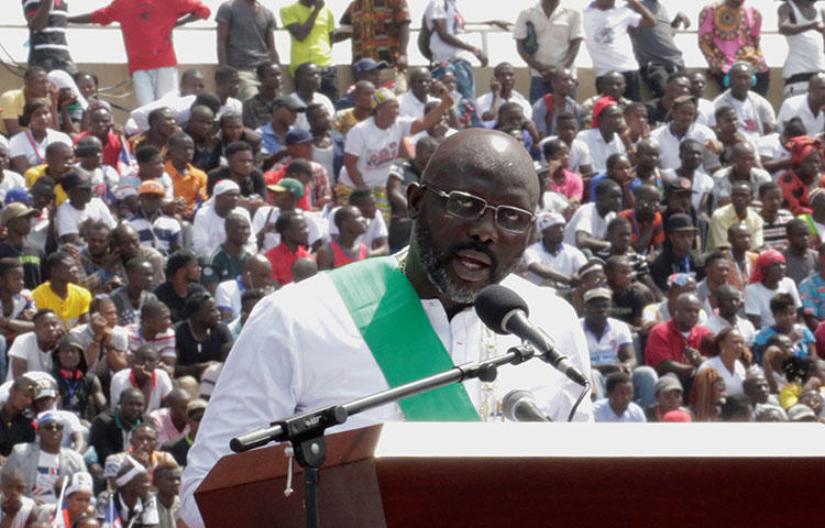 Liberia's President George Weah speaks during his swearing-in ceremony at Samuel Kanyon Doe Sports Complex in Monrovia, Liberia on January 22, 2018. One of the plaintiffs in a US$1.8 million civil defamation lawsuit against Front Page Africa was previously affiliated with Weah's Coalition for Democratic Change party. (Reuters/Thierry Gouegnon)