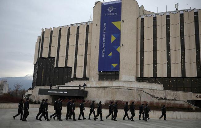 Police patrol outside the National Palace of Culture during a ceremony starting Bulgaria's six-month presidency of the European Union in Sofia, Bulgaria, January 12, 2018. (Reuters/Stoyan Nenov)
