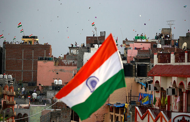 An Indian flag flies in Delhi on the country's Independence Day, August 15, 2017. The Delhi High Court on May 24, 2018, issued an injunction that forbids the screening of Operation 136: Part II, a documentary that alleges more than 24 media organizations were willing to publish advantageous stories for payment, according to reports. (Reuters/Cathal McNaughton)