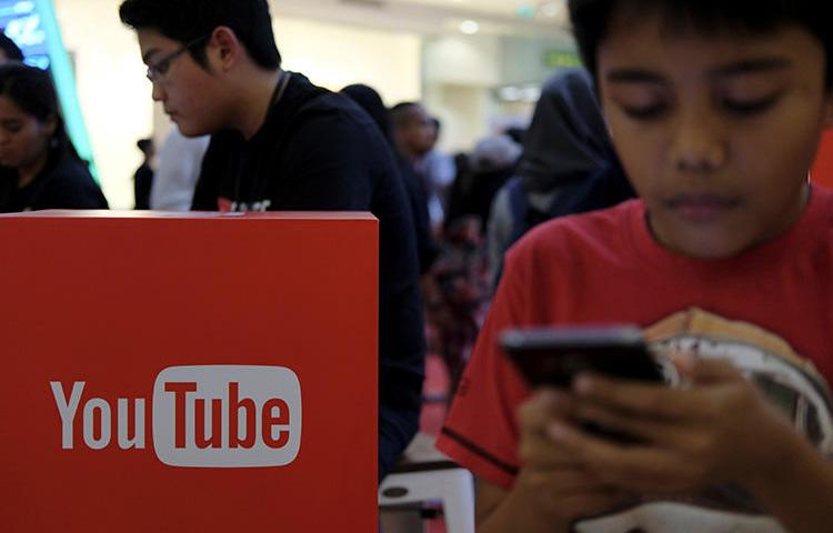 People attend the YouTube Fanfest in Jakarta, Indonesia, in October 2016. Google released its first YouTube-specific transparency report in May. (Reuters/Beawiharta)