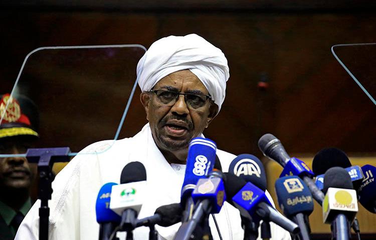 Sudan's President Omar Al-Bashir speaks to parliament in the capital, Khartoum, in April. Sudanese authorities are harassing the critical press by censoring news outlets and questioning journalists. (AFP/Ashraf Shazly)