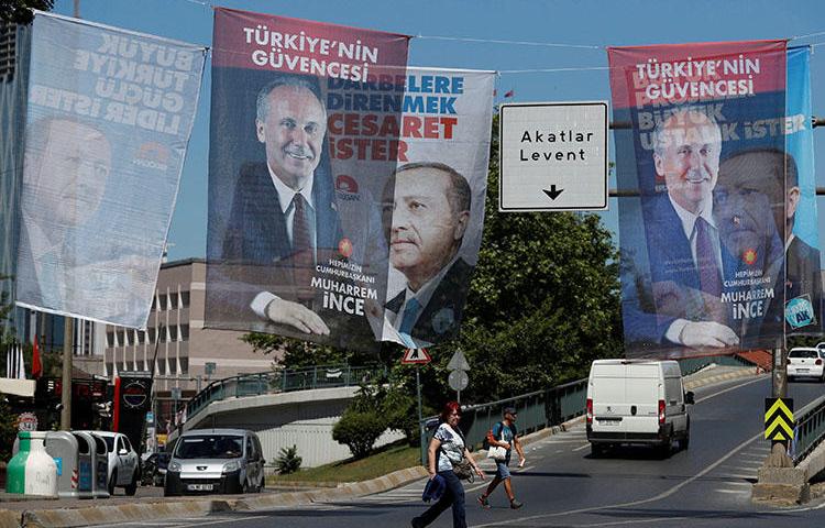 Campaign posters for Turkey's elections are seen in Istanbul in June 2018. The press crackdown continues, with more journalists arrested or charged for reporting critically. (Reuters/Osman Orsal)
