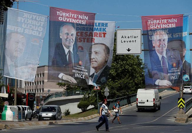 Campaign posters for Turkey's elections are seen in Istanbul in June 2018. The press crackdown continues, with more journalists arrested or charged for reporting critically. (Reuters/Osman Orsal)