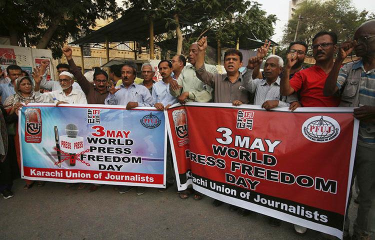 Pakistani journalists rally on Press Freedom Day in Karachi, Pakistan, on May 3, 2018. Two journalists were attacked June 5 in the city of Lahore. (AP Photo/Fareed Khan)