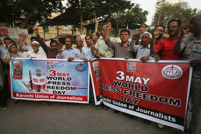 Pakistani journalists rally on Press Freedom Day in Karachi, Pakistan, on May 3, 2018. Two journalists were attacked June 5 in the city of Lahore. (AP Photo/Fareed Khan)