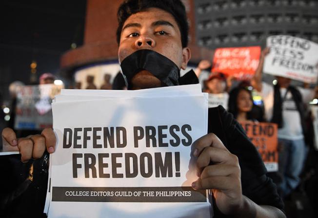 A rally calling for greater press freedom in Manila in January 2018. Philippine journalists say President Rodrigo Duterte is trying to intimidate the media. (AFP/Ted Aljibe)