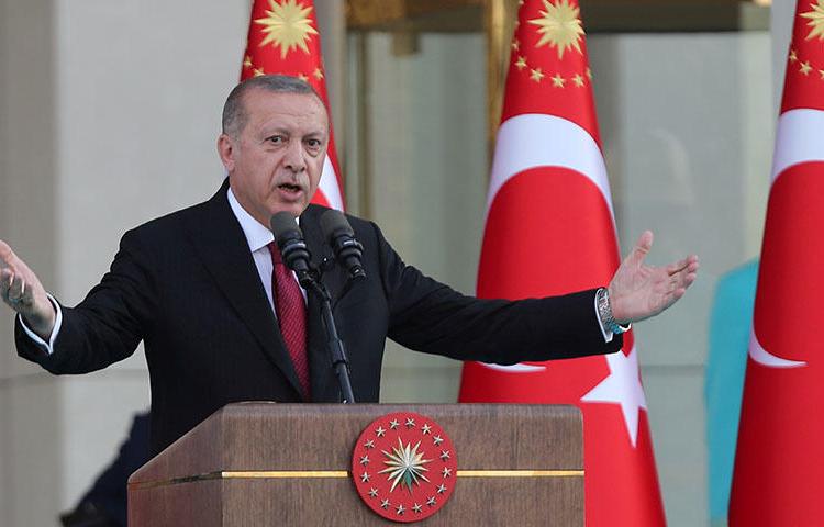 Turkish President Tayyip Erdogan speaks during a ceremony at the Presidential Palace in Ankara, Turkey on July 9, 2018. Turkey's National Security Council, chaired by President Recep Tayyip Erdoğan, on July 8 shuttered three newspapers under a new decree passed the same day, according to reports. (Reuters/Umit Bekta)