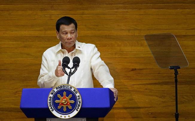 Philippine President Rodrigo Duterte delivers his State of the Nation address on July 23, 2018. A Filipino radio reporter was shot multiple times and died from his injuries on July 20 in the town of Daraga, in the country's central Albay province, according to reports. (Reuters/Czar Dancel)