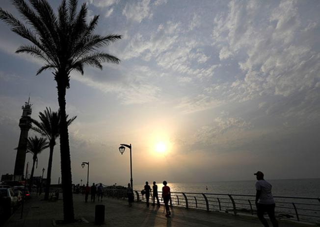 Sunset at the seaside in Beirut, Lebanon in May 2018. Beirut's Publication Court on July 5, 2018, convicted and fined five Lebanese journalists for offenses including criminal defamation and spreading false news, according to reports. (Reuters/ Jamal Saidi)
