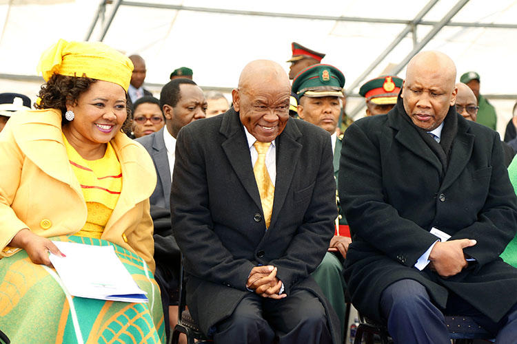 Lesotho Prime Minister Thomas Thabane, center, First Lady Maesaea Thabane, and King Letsie III are pictured during Thabane's inauguration on June 16, 2017 in Maseru. MoAfrika FM has reported critically on the prime minister and his wife. (Samson Motikoe/AFP)
