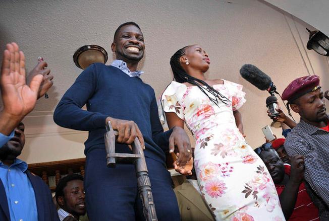 Opposition MP Kyagulanyi Ssentamu, known as Bobi Wine, and his wife Barbara Itungo Kyagulanyi, pictured at their home in Kampala, on September 20. Police detained at least eight journalists who were covering Bobi Wine's return to Uganda from the U.S. (AP/Ronald Kabuubi)