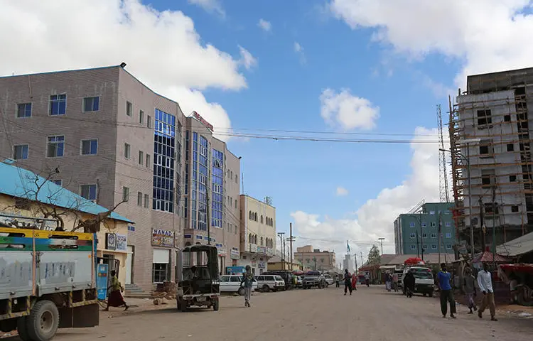 A general view shows people walking along a street in Galkayo on April 21, 2015. A radio reporter and photographer was killed in Galkayo on September 19, 2018. (Reuters/Feisal Omar)