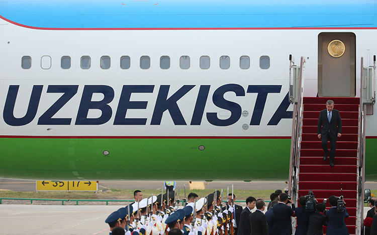 Uzbekistan's President Shavkat Mirziyoyev arrives in China for a summit in June 2018. In recent weeks, police in several Uzbek cities arrested bloggers who cover religious issues. (Pool via Reuters/Wu Hong)