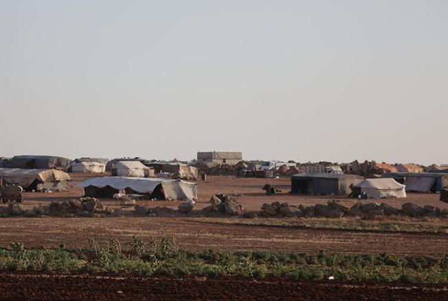 Tents are shown at a refugee camp for internally displaced Syrians in Idlib province on July 30, 2018. Syrian authorities arrested a news anchor for Iraqi Kurdish broadcaster Rudaw, who had recently discussed on air fears of a large-scale military offensive on the province. (Reuters/Khalil Ashawi)