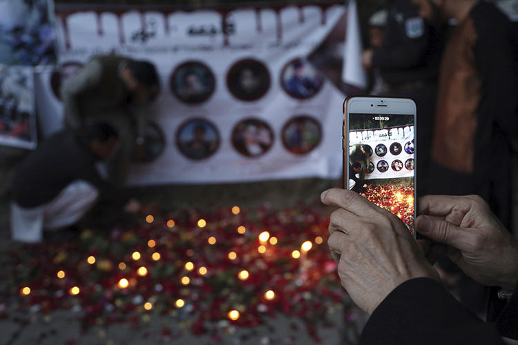 A tribute to victims of an April 2018 suicide attack in Afghanistan’s capital Kabul, that killed at least nine journalists. (AP/Rahmat Gul)