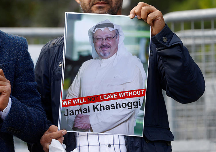 A demonstrator holds a picture of Saudi journalist Jamal Khashoggi during a protest in front of Saudi Arabia's consulate in Istanbul, Turkey, on October 5, 2018. Khashoggi has not been seen since entering the consulate on October 2. (Reuters/Osman Orsal)