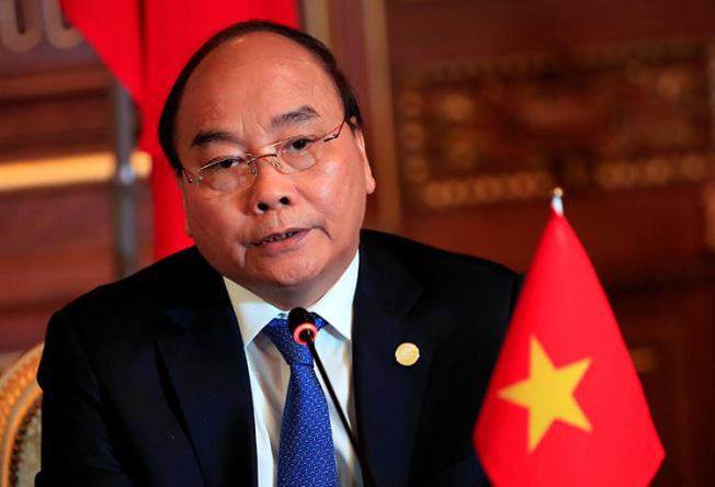 Vietnamese Prime Minister Nguyen Xuan Phuc attends a news conference in Tokyo, Japan, on October 9, 2018. Vietnam sentenced a citizen journalist to prison on an anti-state charge on October 12. (Franck Robichon/Pool via Reuters)