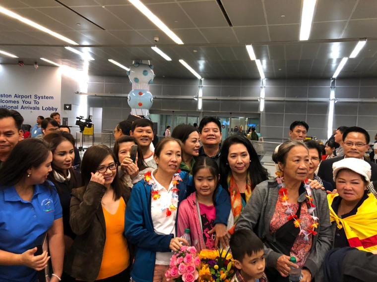 Vietnamese blogger Nguyen Ngoc Nhu Quynh, known by her pen name "Mother Mushroom," (center, in white) with a group of supporters upon her arrival at the airport in Houston, Texas, on Thursday. (Danlambao News)