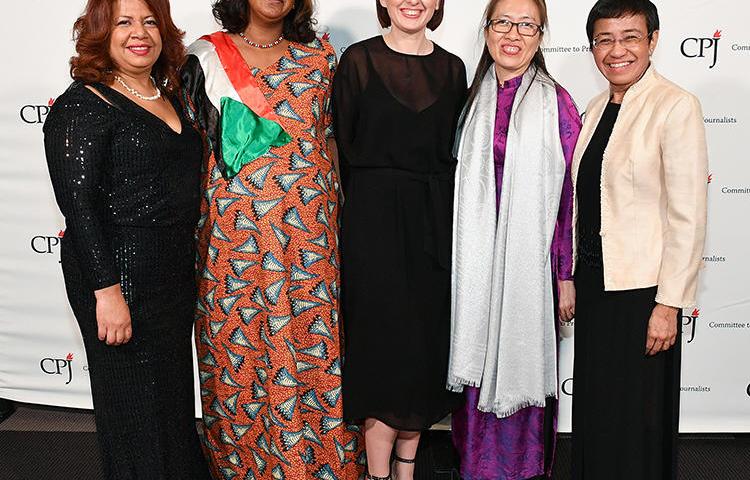Luz Mely Reyes, Amal Habbani, Anastasiya Stanko, Nguyen Ngoc Nhu Quynh, and Maria Ressa. (Getty Images/Dia Dipasupil)