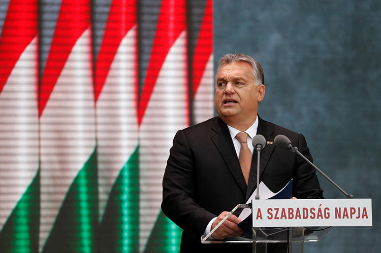 Hungarian Prime Minister Viktor Orban delivers a speech during the celebrations of the 62nd anniversary of the Hungarian Uprising of 1956, in Budapest, Hungary, on October 23, 2018. Hungarian authorities brought criminal charges against a prominent investigative journalist on October 18. (Reuters/Bernadett Szabo)
