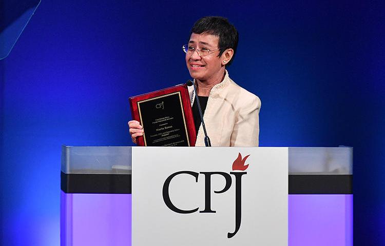 Maria Ressa, founder and editor of the Philippine news site Rappler, accepting CPJ's International Press Freedom Award on November 20, 2018. Ressa and Rappler are facing increasing legal harassment by the Philippine government. (Getty Images/Dia Dipasupil)