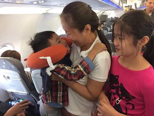 Nguyen Ngoc Nhu Quynh, Vietnamese journalist and CPJ's 2018 award winner, on a plane after being released from prison. (Family photo)