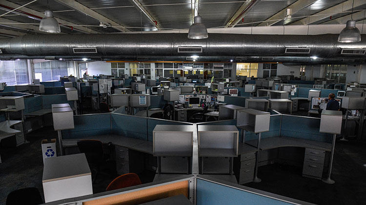 The near deserted newsroom of Caracas daily El Nacional, pictured in October. Like many Venezuelan outlets, several of its journalists are in exile to escape legal action and the deepening economic crisis. (AFP/Federico Parra)