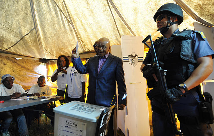 Lesotho Prime Minister Thomas Thabane casts his vote in Maseru, Lesotho, on February 28, 2015. Lesotho's military spokesman threatened an investigative journalist over her reporting in a December 5, 2018, letter. (AP Photo)