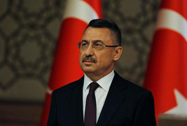 Turkey's Vice President Fuat Oktay, pictured in Ankara in July 2018. Oktay said during parliamentary questions that authorities have revoked nearly 2,000 press credentials in the past three years (AP/Burhan Ozbilici)