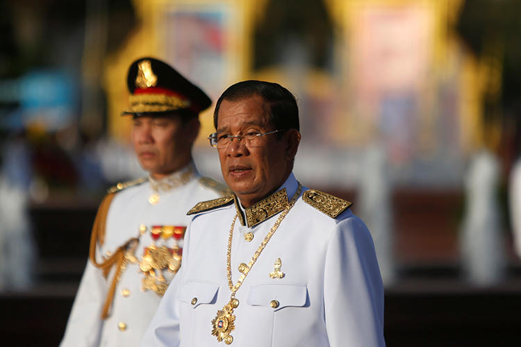 Cambodian Prime Minister Hun Sen attends celebrations marking the 65th anniversary of the country's independence from France, in Phnom Penh, Cambodia, on November 9, 2018. A Cambodian news fixer was deported from Thailand to Cambodia on a 'false news' accusation on December 12. (Reuters/Samrang Pring)
