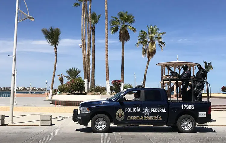 Agents of the Federal Police patrol in Baja California Sur state, Mexico, on March 12, 2018. On January 29, 2019, journalist Martín Valtierra García was beaten by two unknown assailants outside his home in Comondù, Baja California Sur. (Daniel Slim/AFP)