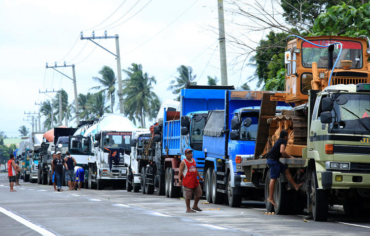 Vehicles on a highway heading to the port in Matnog, Sorsogon, the Philippines, on December 17, 2017. A radio broadcaster was killed in Sorsogon City on January 9, 2018. (AFP/Charism Sayat)