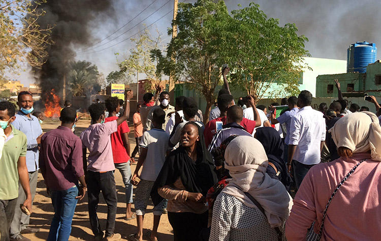 An anti-government rally in Khartoum on January 13. Several journalists are detained and Sudanese authorities are censoring newspapers to try to limit coverage of the unrest. (AP)